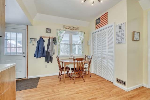 dining area featuring wood-type flooring