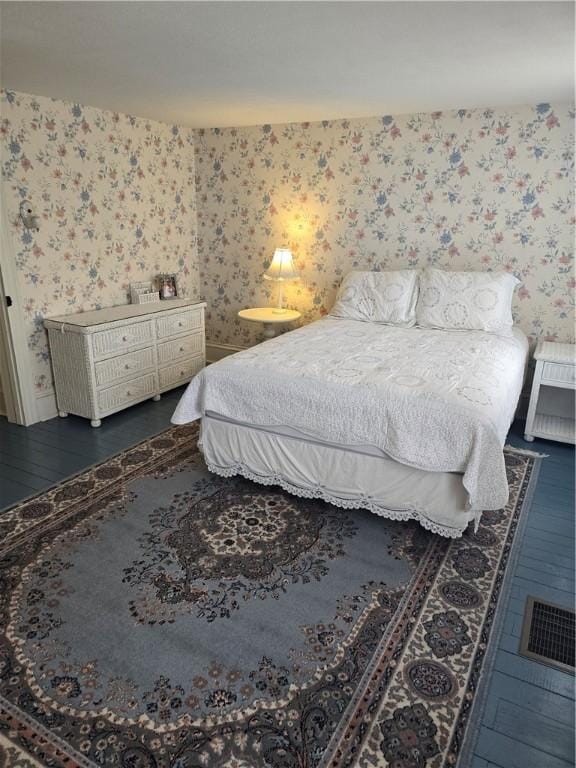 bedroom featuring dark wood-type flooring