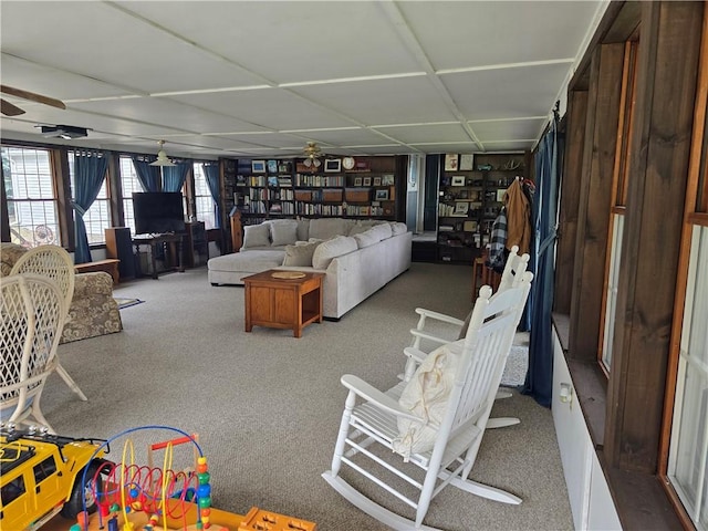 living room featuring ceiling fan