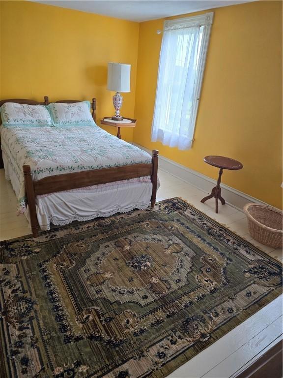 bedroom featuring tile patterned floors