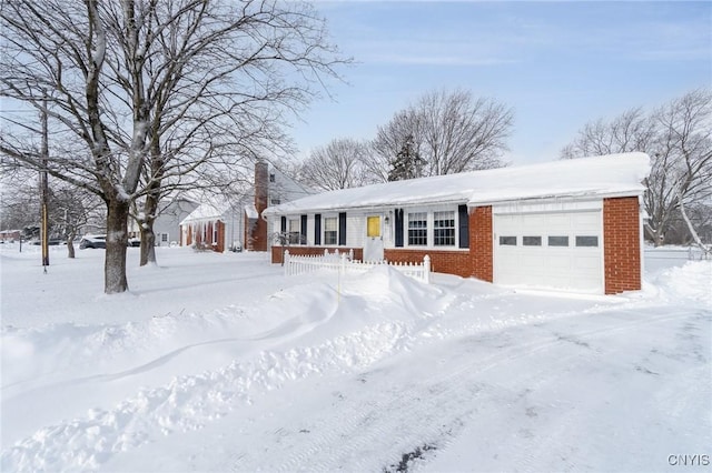 single story home with a garage