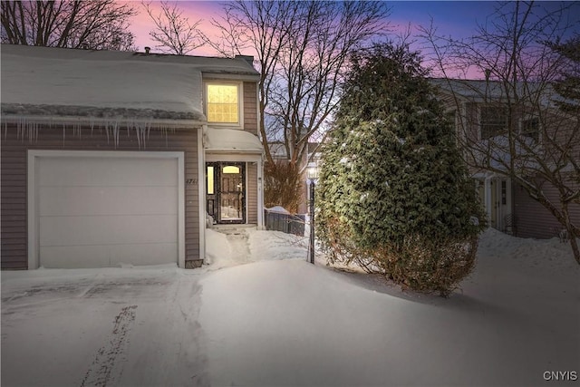 view of front of house with a garage