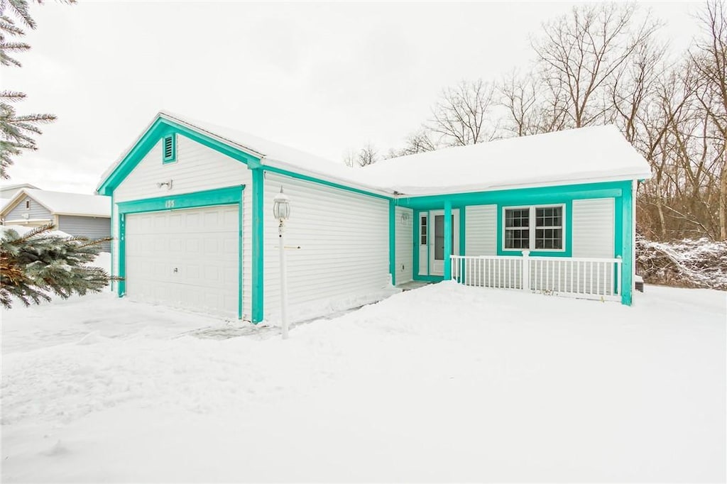 155 Hickory Manor Dr, Gates, NY 14606 - view of front facade with a garage