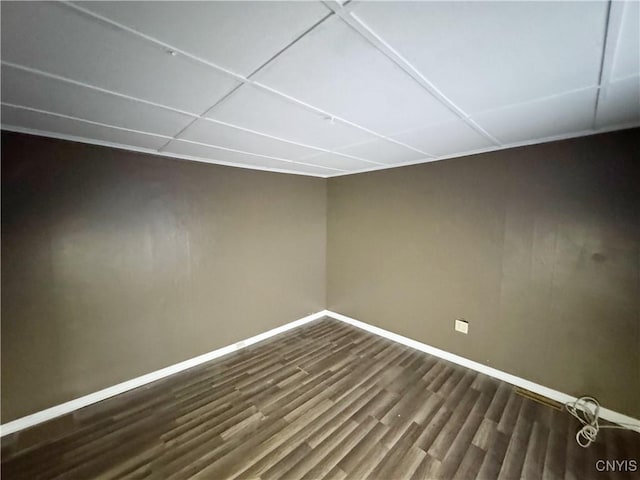 spare room featuring hardwood / wood-style flooring