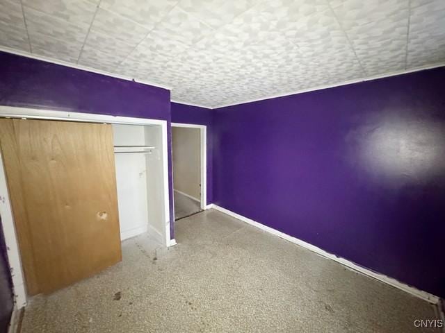 unfurnished bedroom featuring a closet