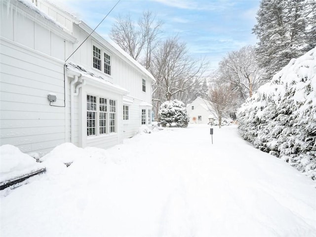 view of snow covered house