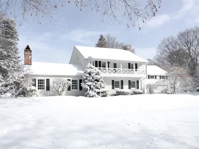 view of snow covered front of house