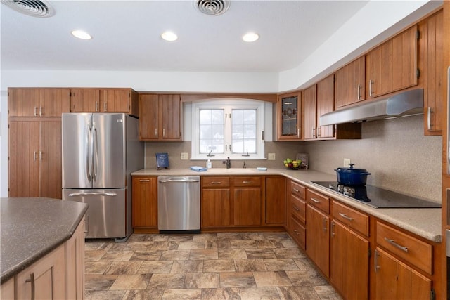 kitchen featuring appliances with stainless steel finishes and sink