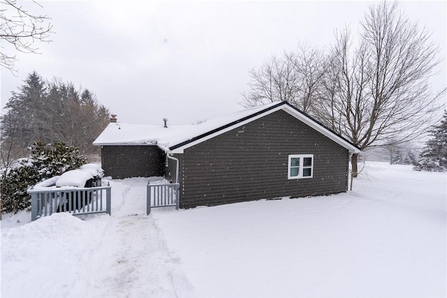 view of snow covered property