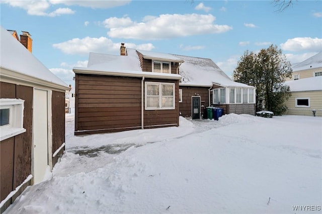 view of snow covered property