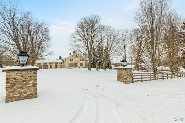 view of yard covered in snow