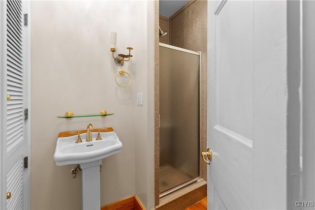 bathroom featuring a stall shower