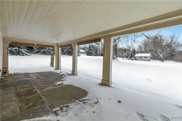 view of snow covered patio