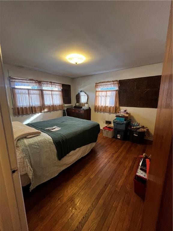 bedroom featuring wood finished floors