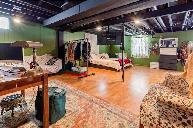 bedroom with wood finished floors