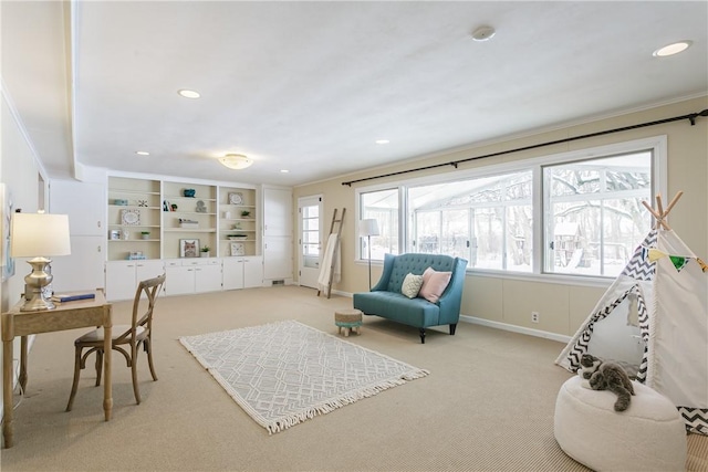 interior space featuring recessed lighting, baseboards, and light colored carpet