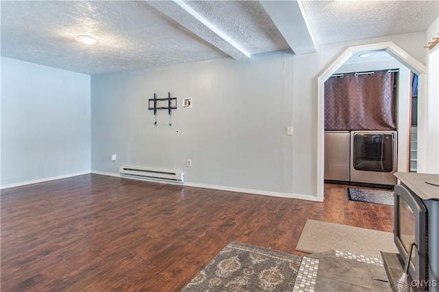 32702 Old Town Springs Rd, Clayton, NY 13622 - living area featuring baseboards, a textured ceiling, wood finished floors, and a baseboard radiator