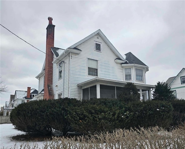 exterior space with a chimney