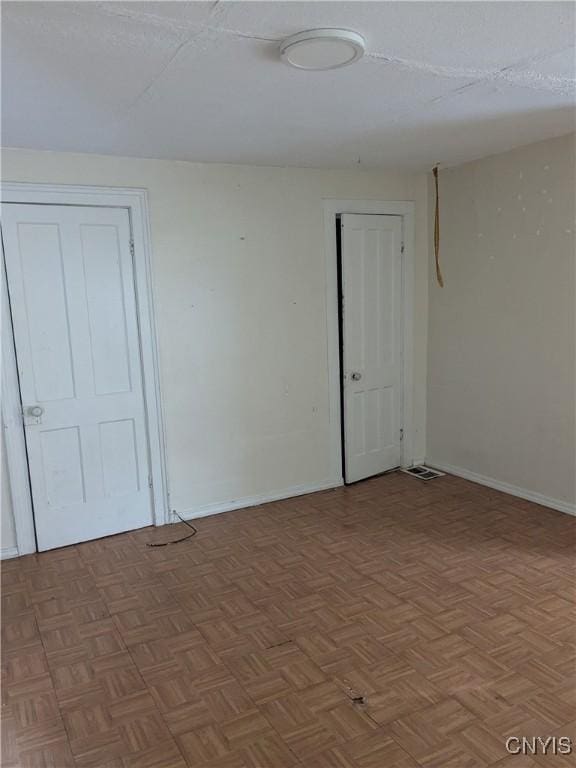 1509 Sunset Ave, Utica, NY 13502 - spare room with baseboards