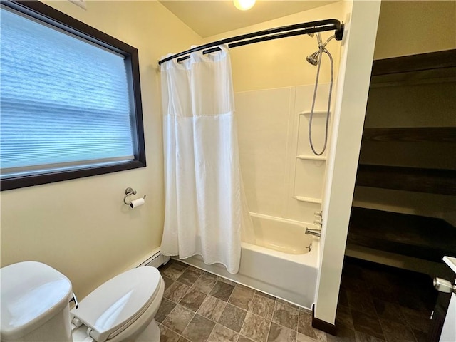 bathroom with shower / bath combo and toilet