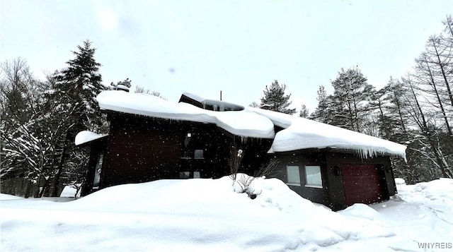 view of snow covered property