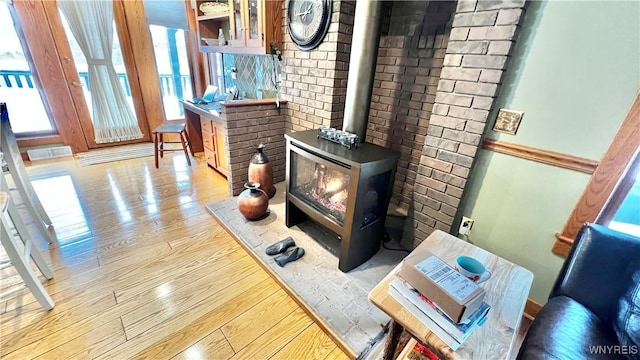 6539 Plum Creek Rd, Mansfield, NY 14731 - detailed view of wood finished floors and a wood stove