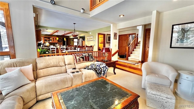 living room with stairs