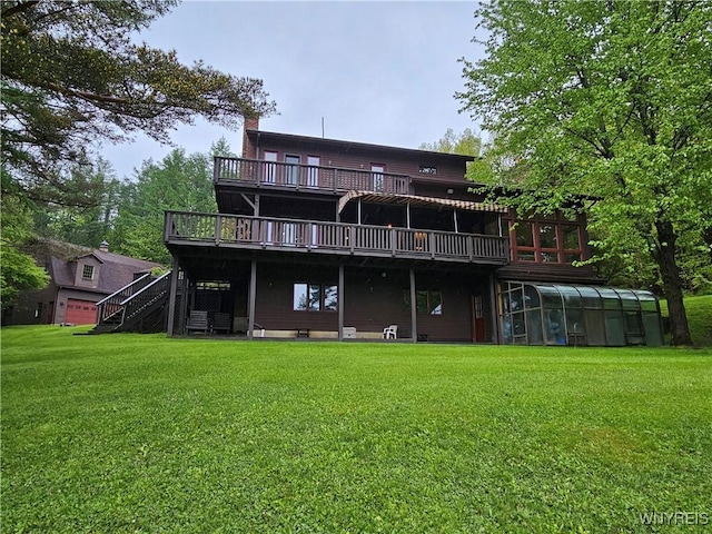 6539 Plum Creek Rd, Mansfield, NY 14731 - rear view of house with a wooden deck, a yard, a chimney, and stairs