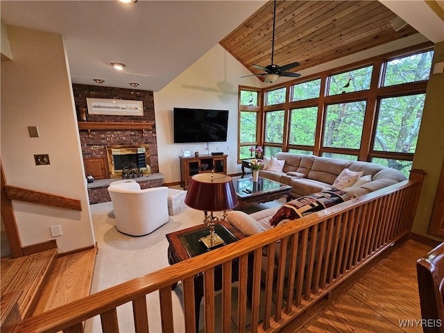 6539 Plum Creek Rd, Mansfield, NY 14731 - living room with a brick fireplace, ceiling fan, baseboards, wooden ceiling, and wood finished floors