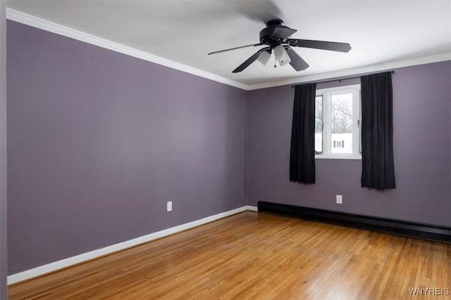 empty room with baseboards, a baseboard radiator, ceiling fan, ornamental molding, and light wood-style floors