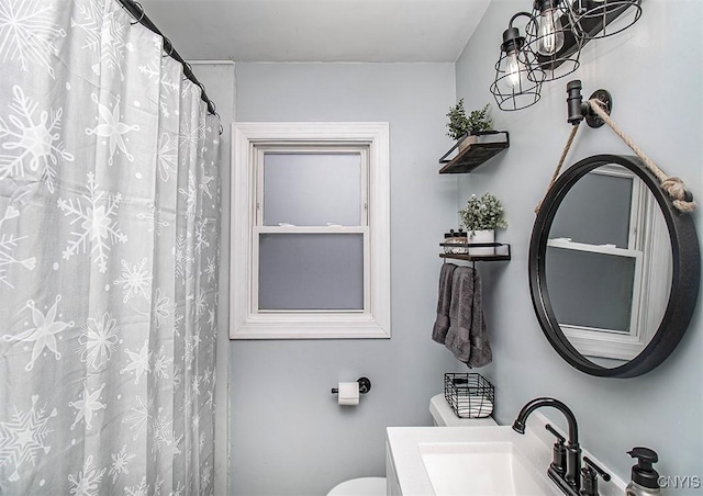 bathroom with vanity and toilet