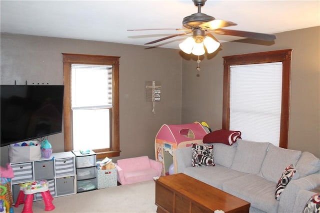 living room with ceiling fan