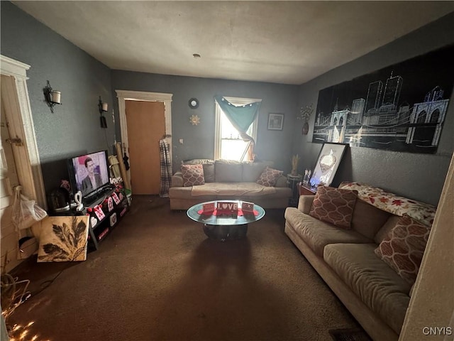 living area featuring carpet flooring