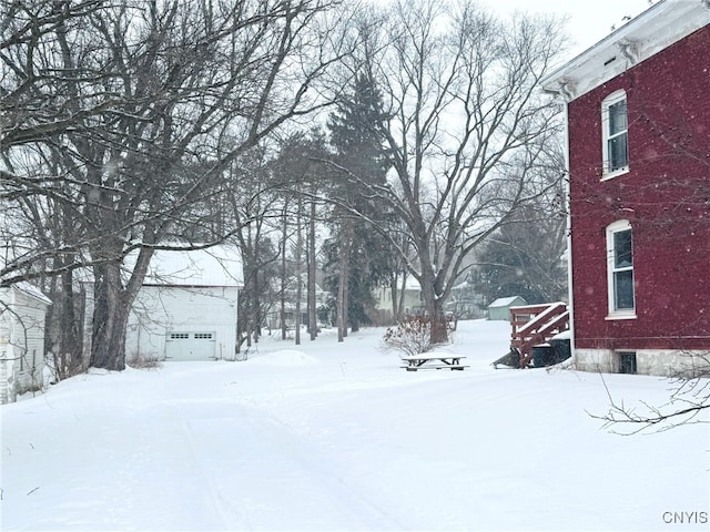 view of yard covered in snow