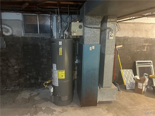 utility room with water heater and heating unit