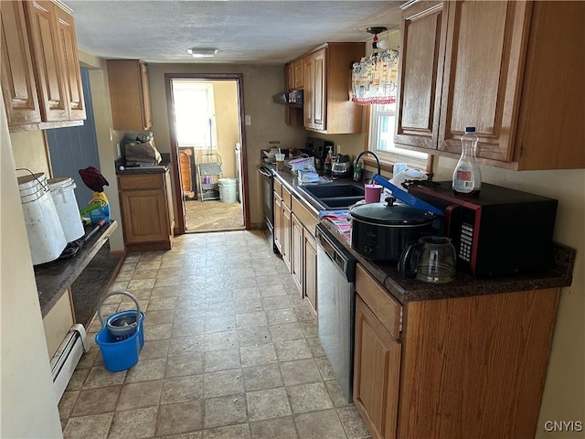 kitchen with electric stove, dishwasher, dark countertops, ventilation hood, and a sink