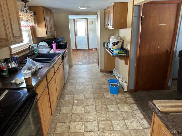 kitchen with dark countertops, a baseboard radiator, a sink, black electric range, and a wealth of natural light