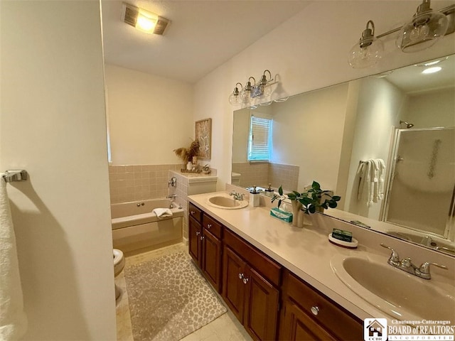 full bathroom with a garden tub, double vanity, a sink, and visible vents