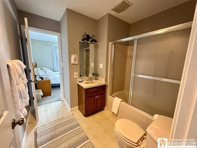 full bath featuring bath / shower combo with glass door, visible vents, toilet, ensuite bathroom, and vanity