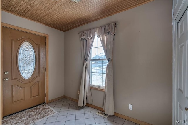 entryway with light tile patterned flooring, wooden ceiling, visible vents, and a healthy amount of sunlight