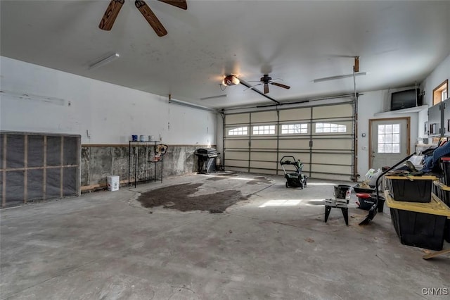 garage featuring a ceiling fan