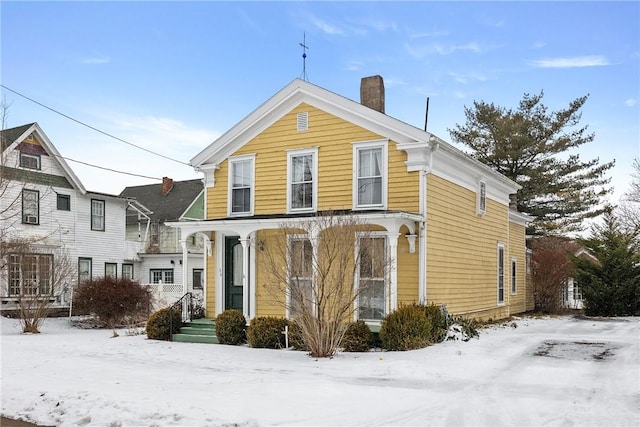 view of front of property with a chimney