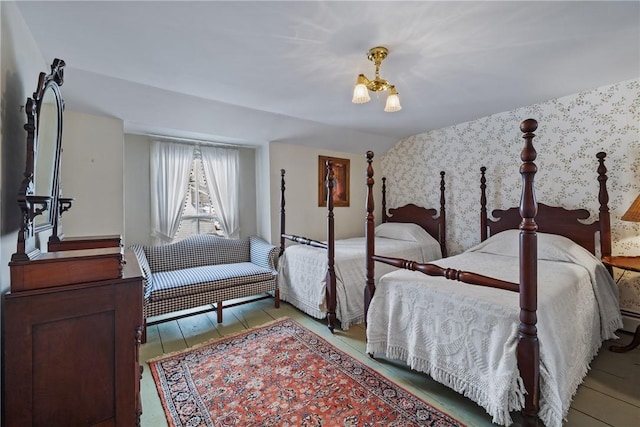 bedroom featuring wallpapered walls