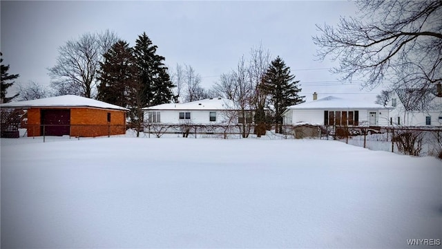 view of yard covered in snow