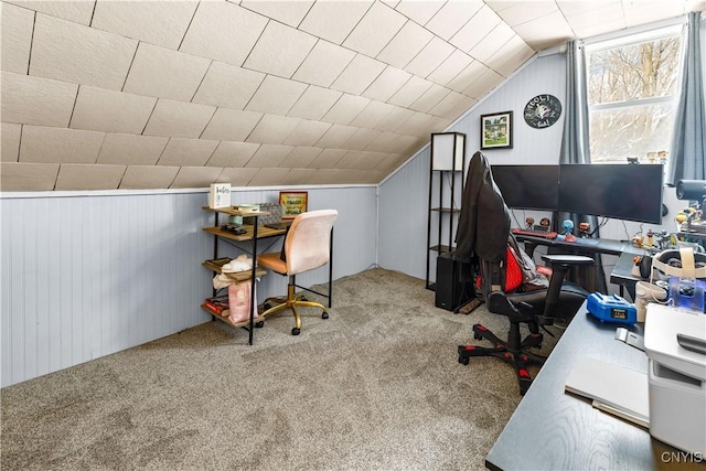 office area with vaulted ceiling and carpet flooring