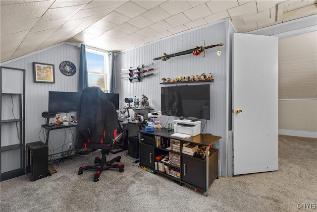 office area featuring lofted ceiling and light carpet