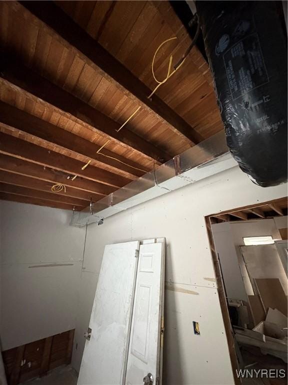 details featuring wood ceiling and beam ceiling