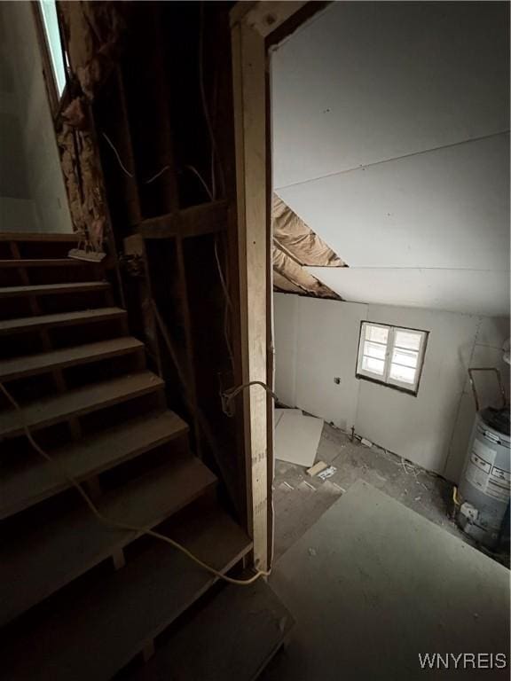 staircase featuring water heater