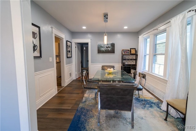 dining room featuring recessed lighting, wainscoting, and dark wood finished floors