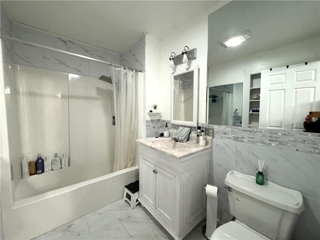 full bath with marble finish floor, vanity, shower / bath combination with curtain, and toilet